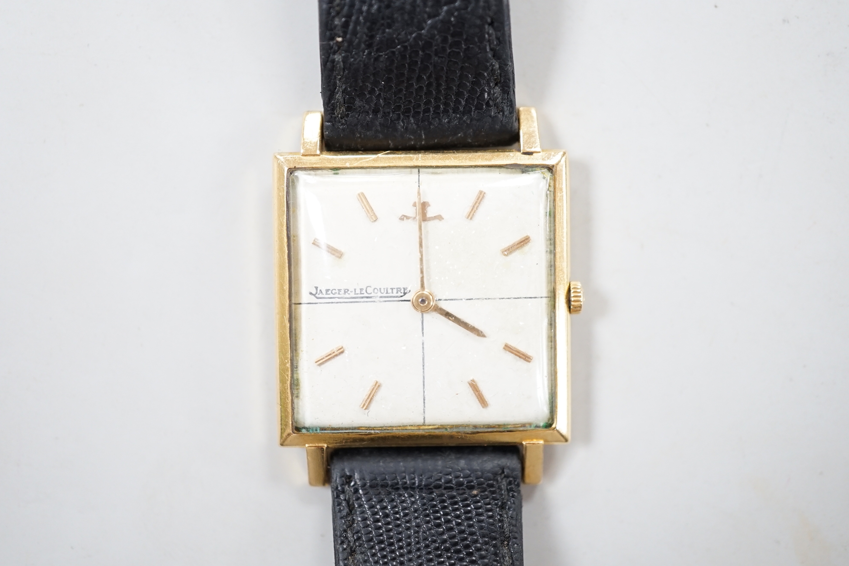 A gentleman's yellow metal (Swiss 750 mark) Jaeger LeCoultre manual wind dress wrist watch, on associated leather strap, no box or papers.